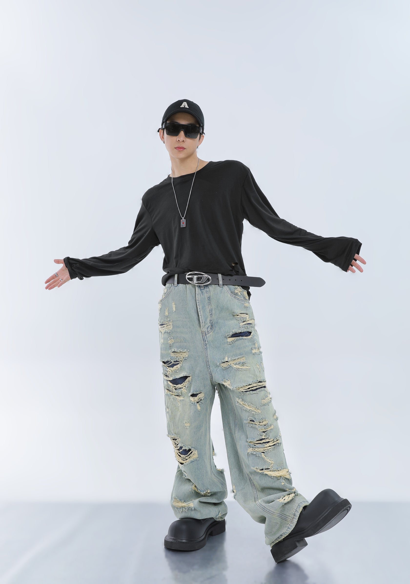 Ripped split fringed jeans