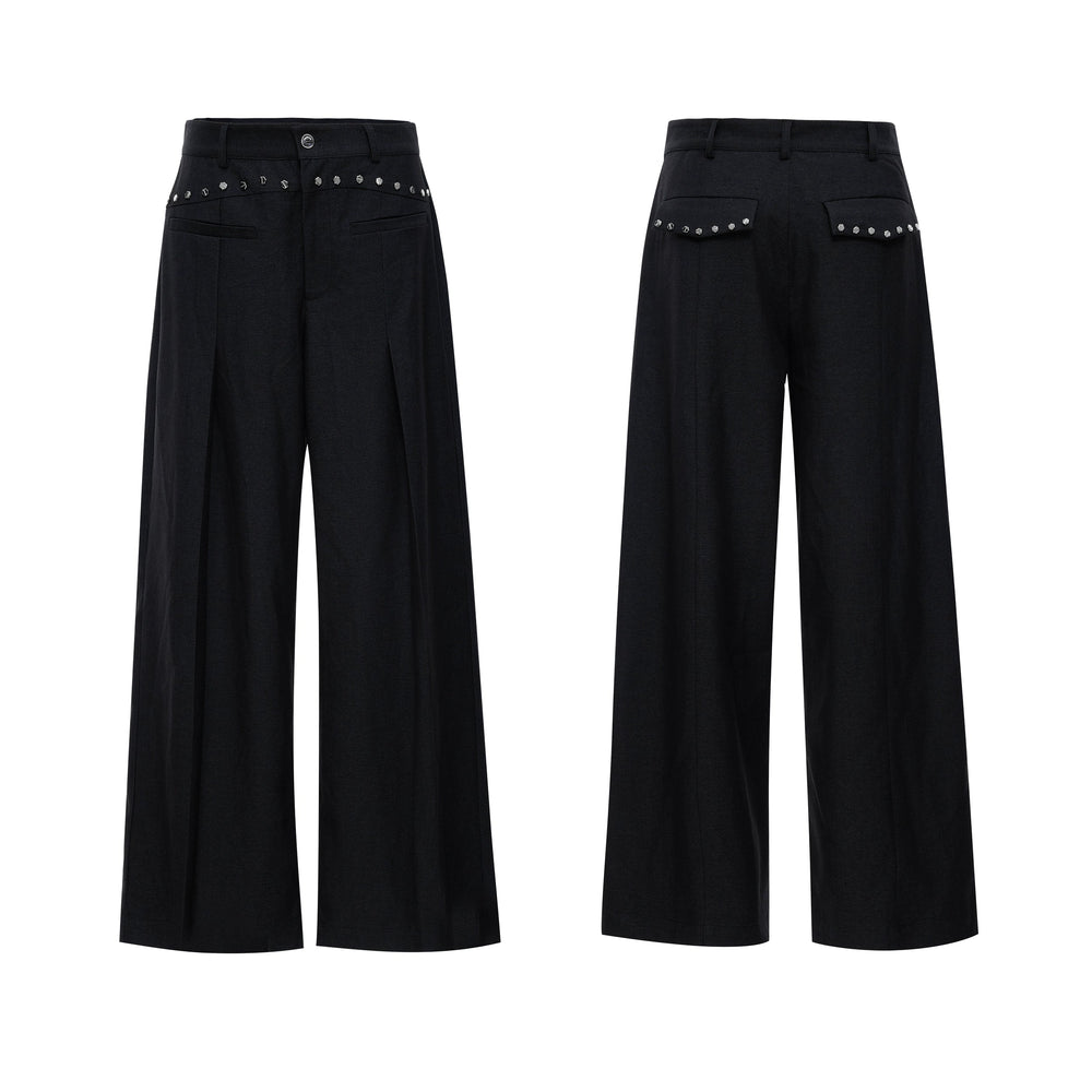 Collarless layered black button-embellished trousers