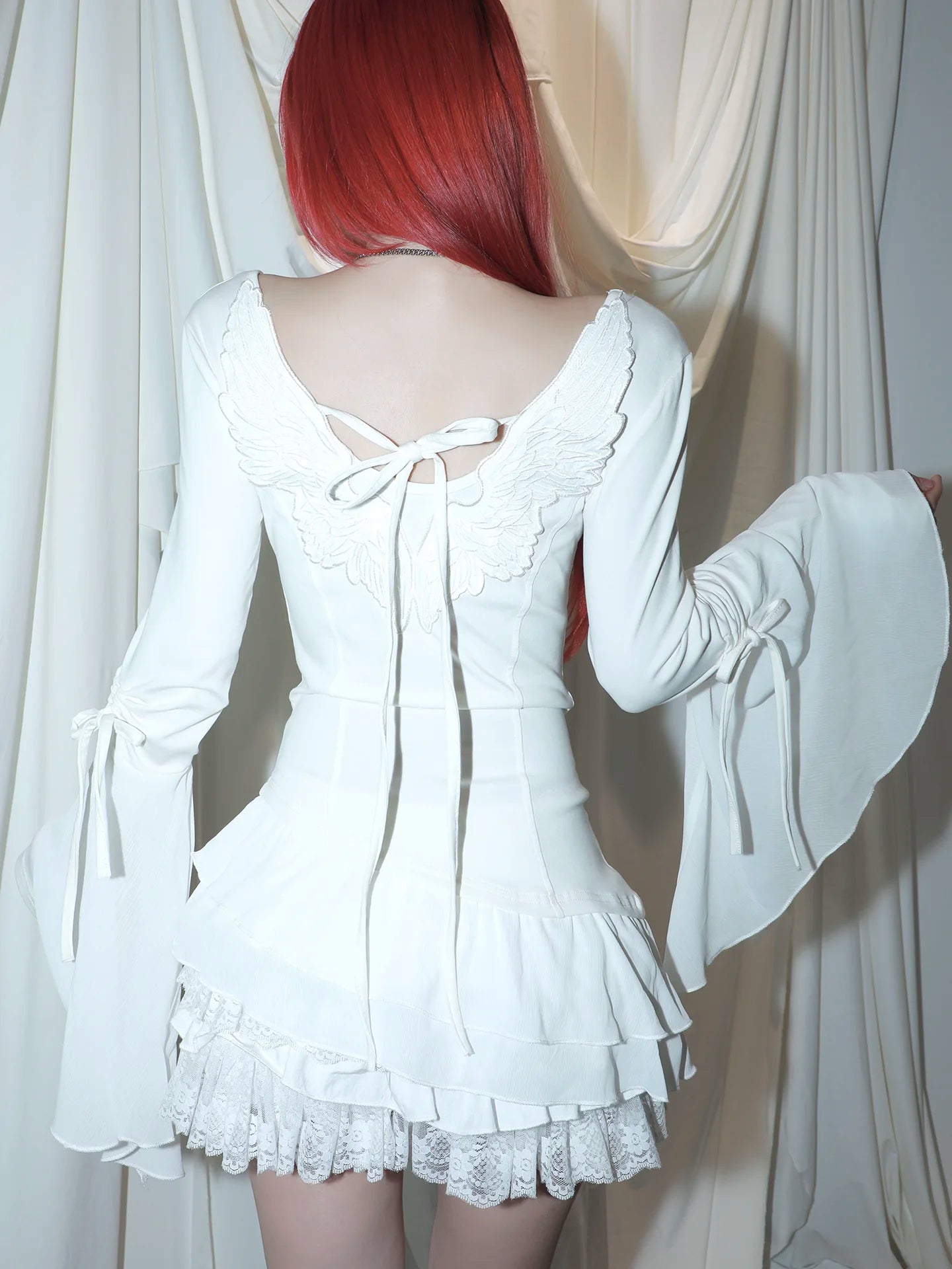 Angel Wing Ruched Long Sleeve Top